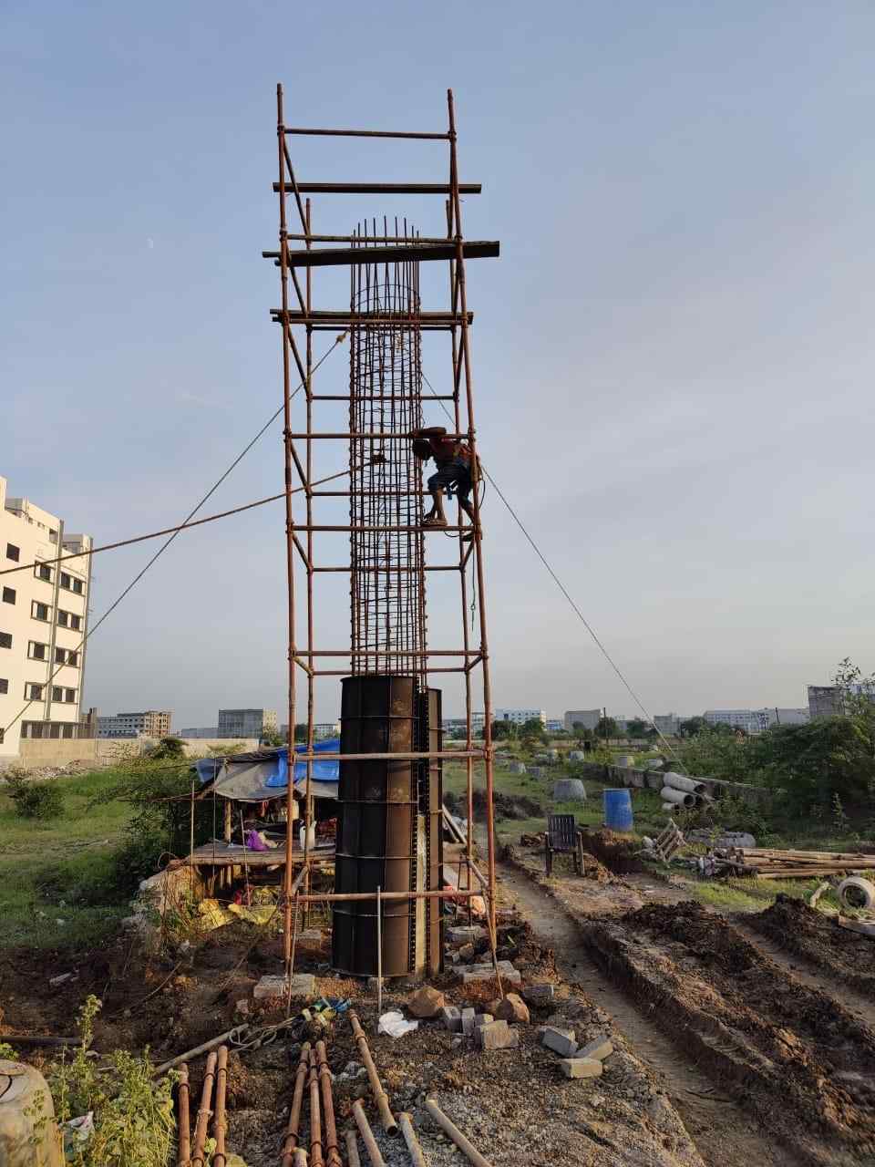 Construction equipment rental yard with scaffolding and shuttering material